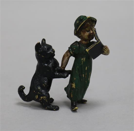 A cold painted bronze of a girl and a cat